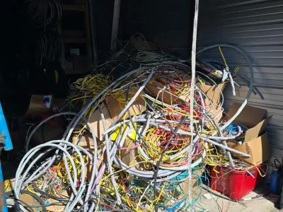Tangled pile of scrap wire in a garage